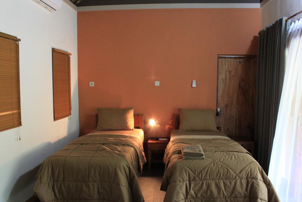 Albany Home Stay Kuta  Quarto foto